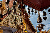 Chiang Mai - Wat Phra That Doi Suthep. The innercourtyard of the temple is filled with Buddha statues and other religious paraphenalia. 